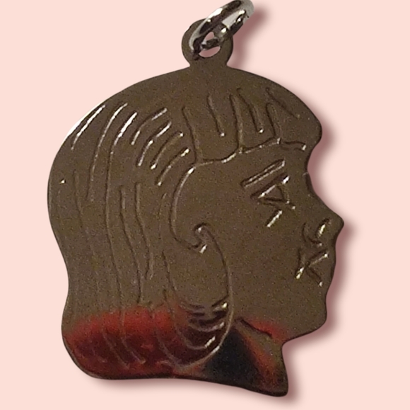 Vintage Jewelry - Vintage sterling girls head pendant